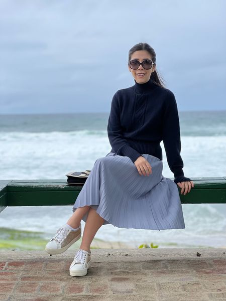 Monochromatic blue gloomy beach day outfit! I paired my navy blue turtleneck sweater with a periwinkle midi pleated skirt for a comfortable and casual look. I kept my accessories minimal with white sneakers and a darker toned shoulder bag. #oldmoney #casualstyle #coastalgrandmother 

#LTKstyletip #LTKshoecrush #LTKSeasonal