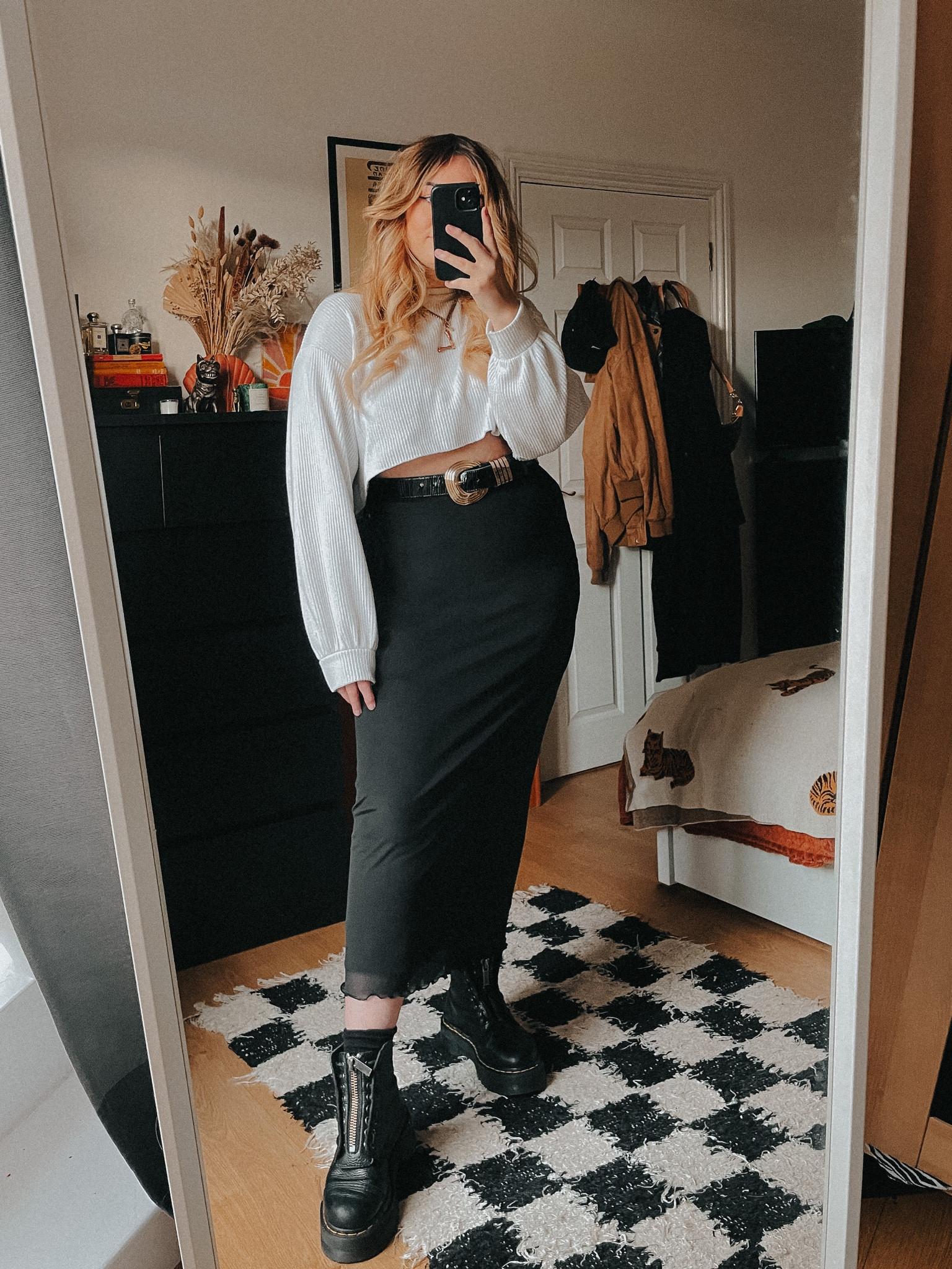 Black midi skirt, white crop jumper and dr marten boots ✌️

#LTKunder100 #LTKeurope #LTKSeasonal