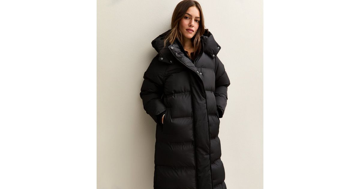 Petite Black Longline Tiered Puffer Jacket | New Look | New Look (UK)