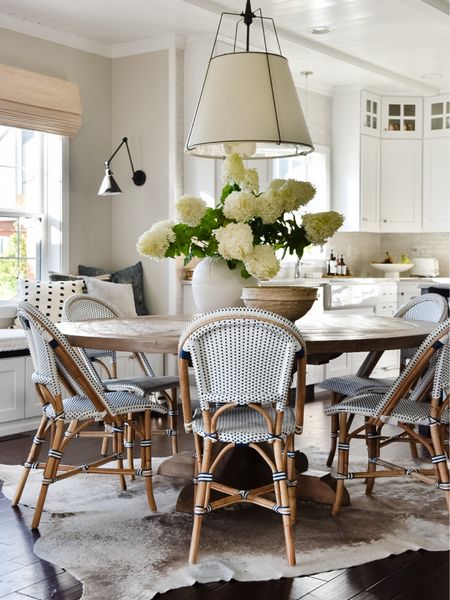 The best part of this coastal transitional dining room is the kid friendly bistro chairs from Serena & Lily. They're so easy to clean. 

The modern light fixture and rustic wood dining table pair for unexpected but beautiful look.

#LTKFamily #LTKHome #LTKSeasonal