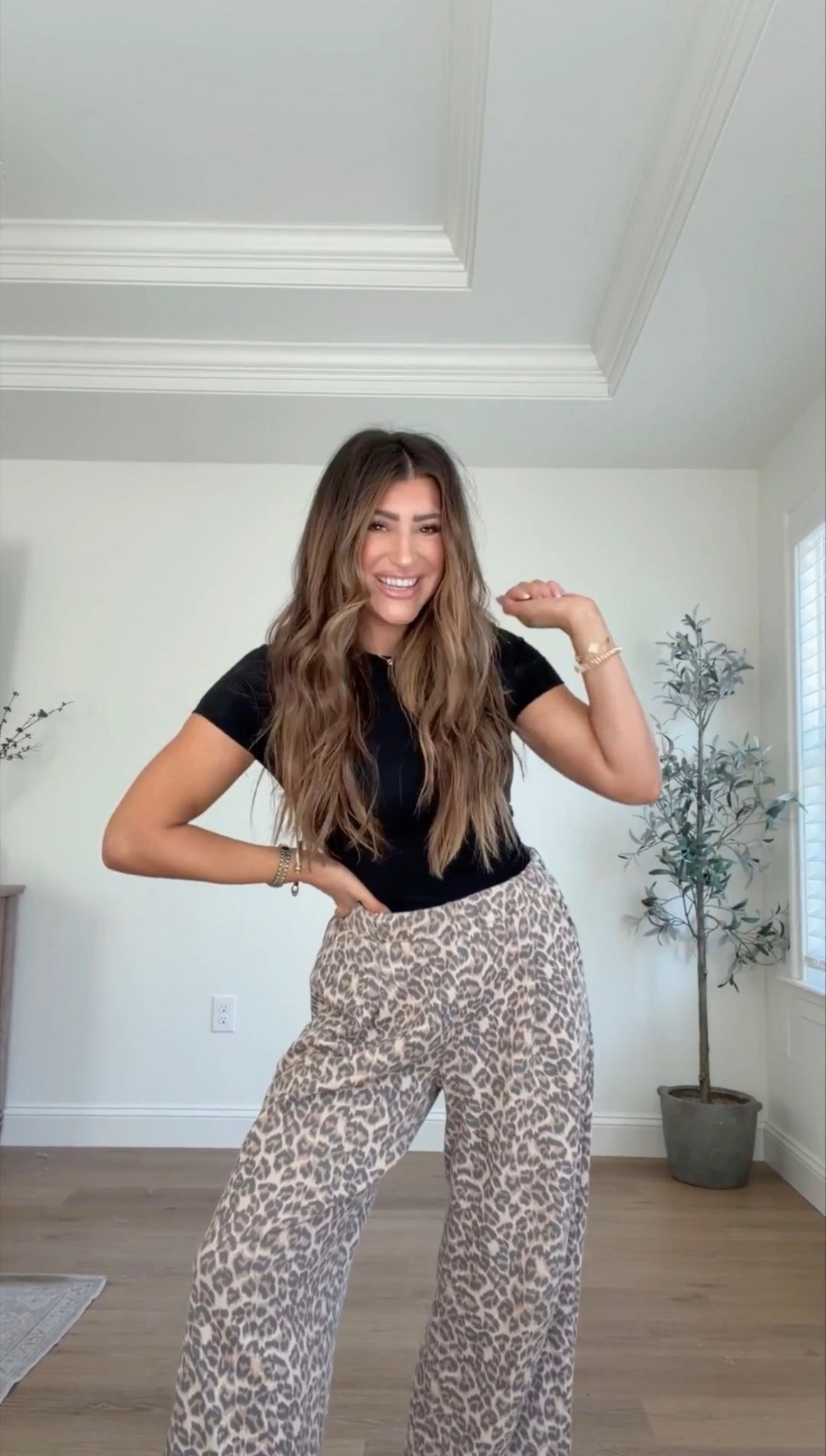 Best basic fitted tshirt. Wearing small here but usually so meds! Meds in leopard trousers- now on sale! 

Vacation outfit, travel outfit. Mom outfit idea. Comfy outfit. 

#LTKTravel #LTKgrwm #LTKSeasonal