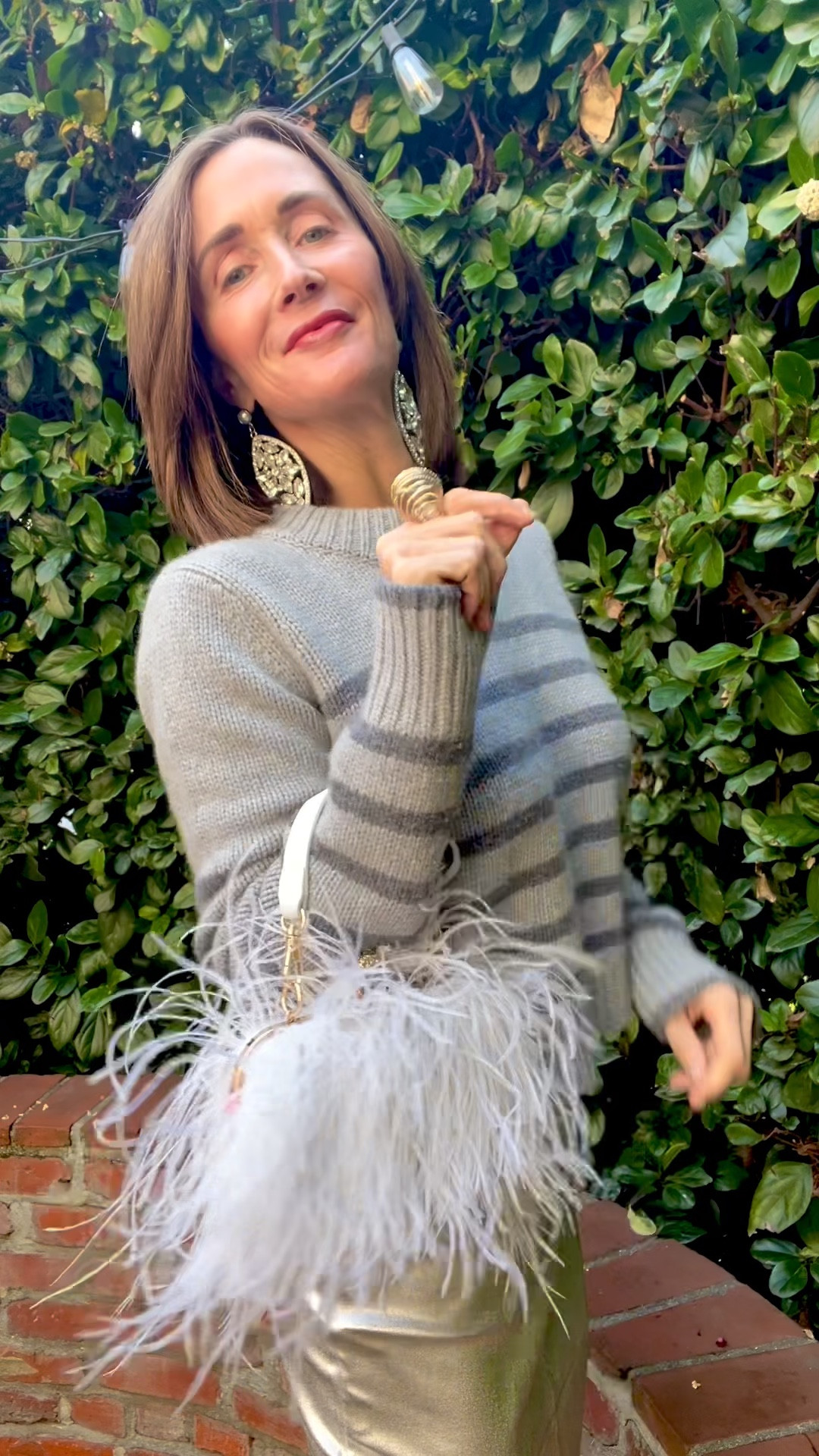 Feathered Up! 
This little purse is just the cutest! Great quality!! Great weight! Great Snow White color!! 
Style Tip: use this bag to add a topic of fashion conversation to any party !!!!! 

#LTKstyletip #LTKfindsunder50 #LTKover40