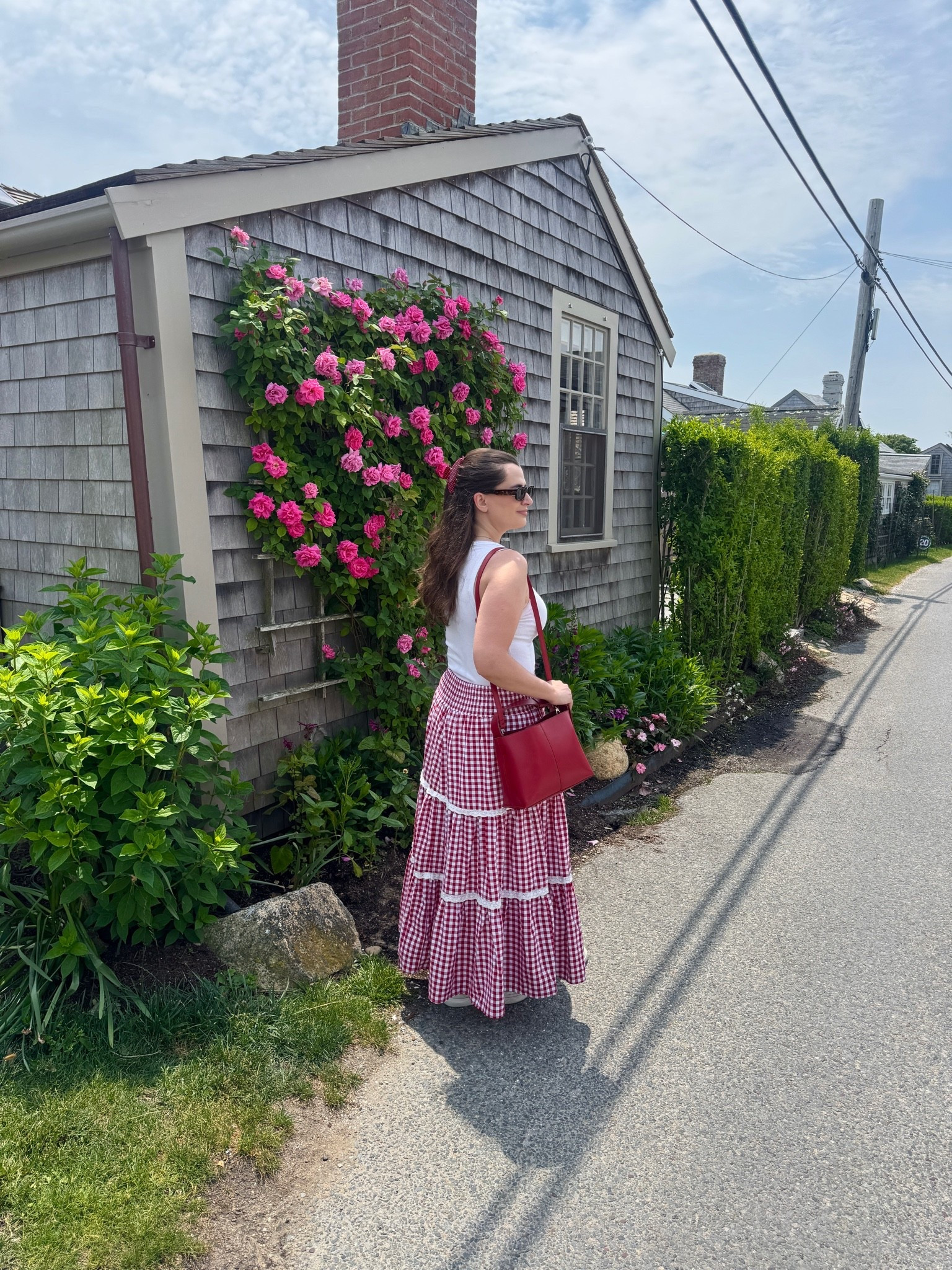 What I wore on Nantucket in June! We did the Sconset bluff walk in this it was so cute! Had my white low top sneakers and a gingham maxi skirt with a plain white tank top. Threw in my red purse and a cute hair clip for accessories!

#LTKootd