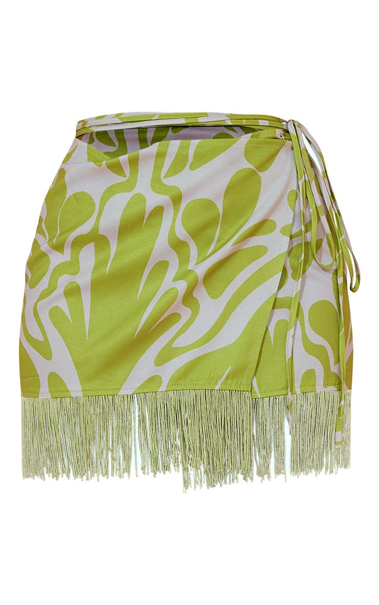 Green Abstract Floral Tassel Hem Wrap Mini Skirt | PrettyLittleThing US