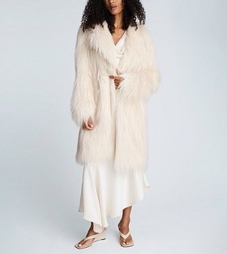 Glam up in a beautiful white coat this winter! The Women's Faux Fur Midi Long-Sleeve Jacket from Steve Madden is under $350.

Keywords: Faux fur coat, winter outfits, winter jackets, winter coats, winter whites, Steve Madden, wool coat, cropped faux fur coat

#LTKgrwm #LTKSeasonal #LTKootd