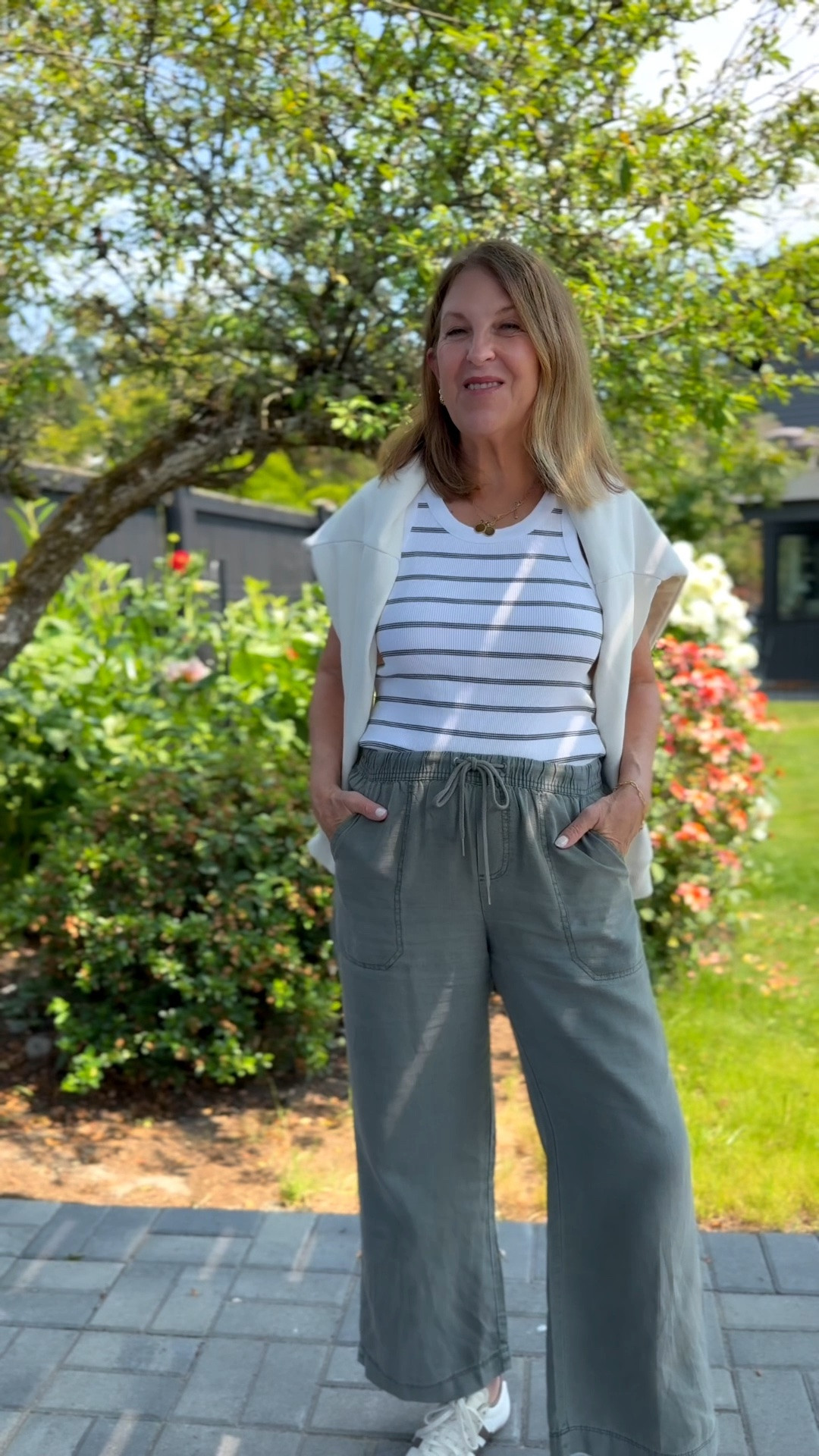 My outfit for an active summer day! 

Lightweight tie-waist pants to wear at home and out. Tank & sweatshirt. Sneakers & raffia tote. 

#stylishsandy

#LTKOver40 #LTKSeasonal #LTKSaleAlert