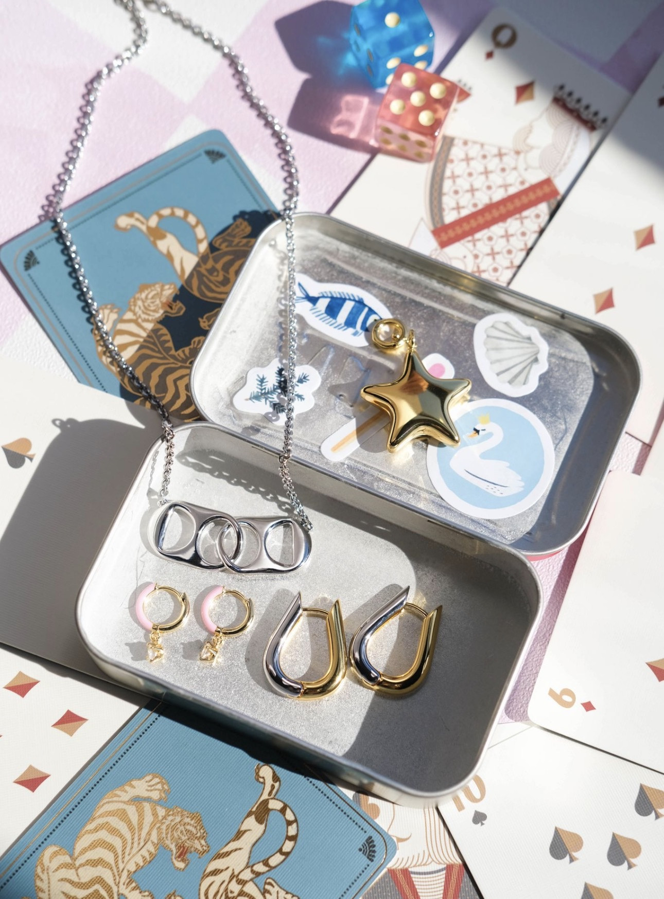 these two toned hoops are waterproof and can be worn with gold or silver in the front. Pair with a soda tab necklace and cute huggies. code KILEE15 gets you 15% off at @Nickelandsuede 

 