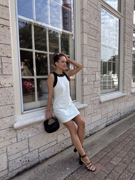 Black & white high neck dress! It’s giving all of the old money aesthetic vibes. It comes in 4 colors & is under $30. I’m wearing a size XS. // white dress, linen dress, summer dress, summer outfit 