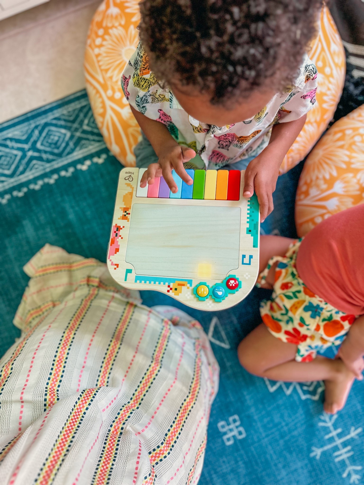 Unleash your little musician's creativity with the Hape Light Up Pixel Piano! This innovative instrument combines vibrant pixel art with engaging play modes, introducing kids to the world of music and fostering creativity, rhythm, and cognitive development. With 3 musical play modes, pixelated animals, and vivid colors, this piano is perfect for aspiring musicians. Watch as the wooden surface transforms into a mesmerizing pixel screen, sparking curiosity and wonder. 

#Hape #PixelPiano #MusicalLearning #KidsMusic #CreativePlay

#LTKGiftGuide #LTKBaby #LTKKids