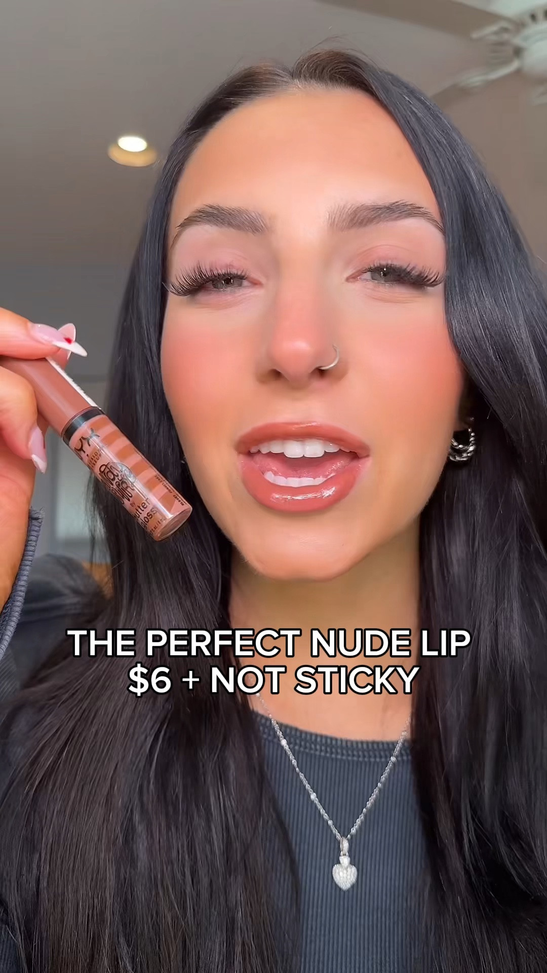 The perfect affordable nude lip! Not sticky, super hydrating, and the perfect brown nude! Wear on its own or over a liner/ lipstick! I’m wearing shade “funnel cake"

#LTKbeauty #LTKsalealert #LTKSpringSale