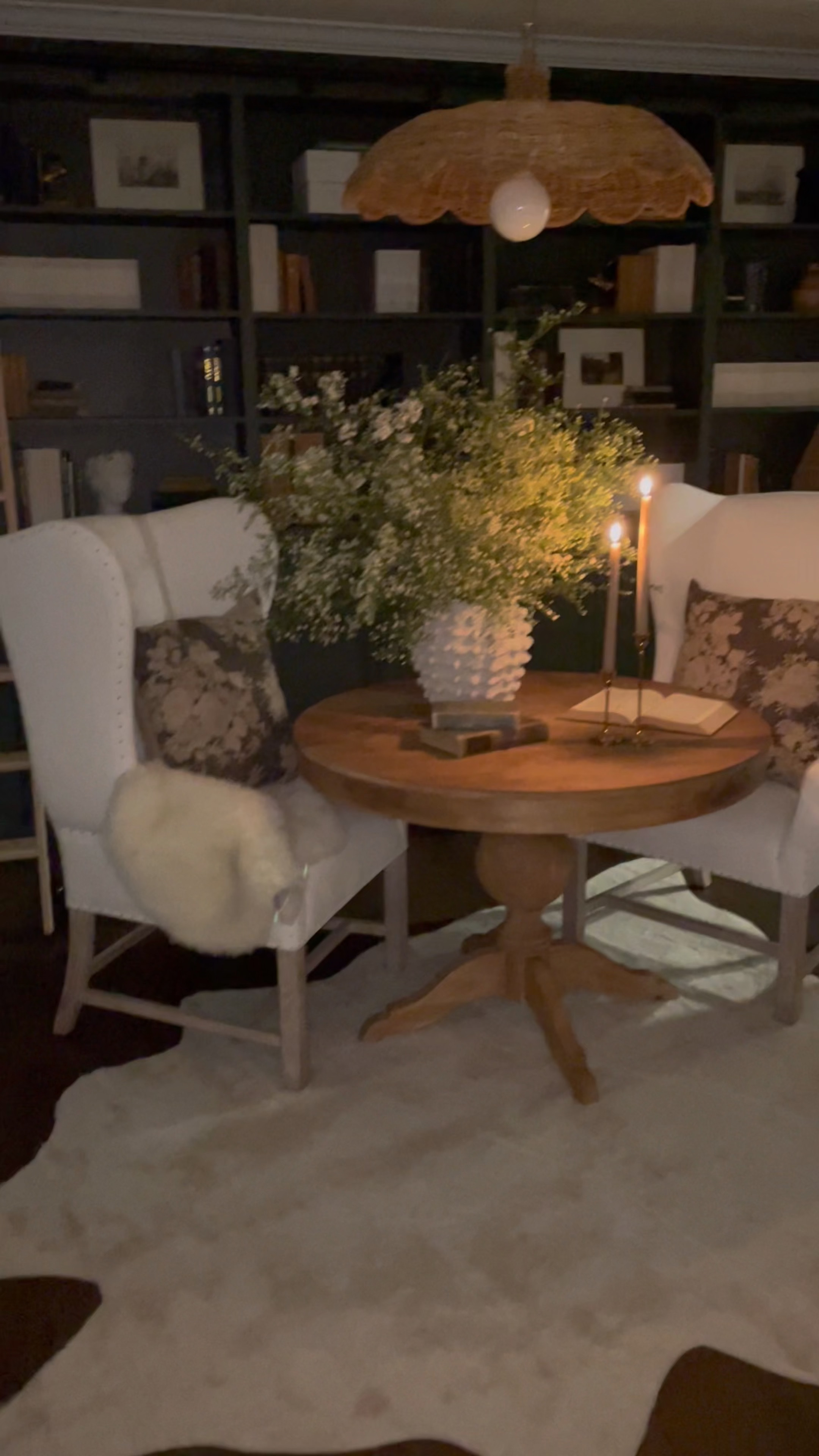 Candlelight in our library on a cool fall evening… #library #candle #ikeahack 

#LTKVideo #LTKSeasonal #LTKhome