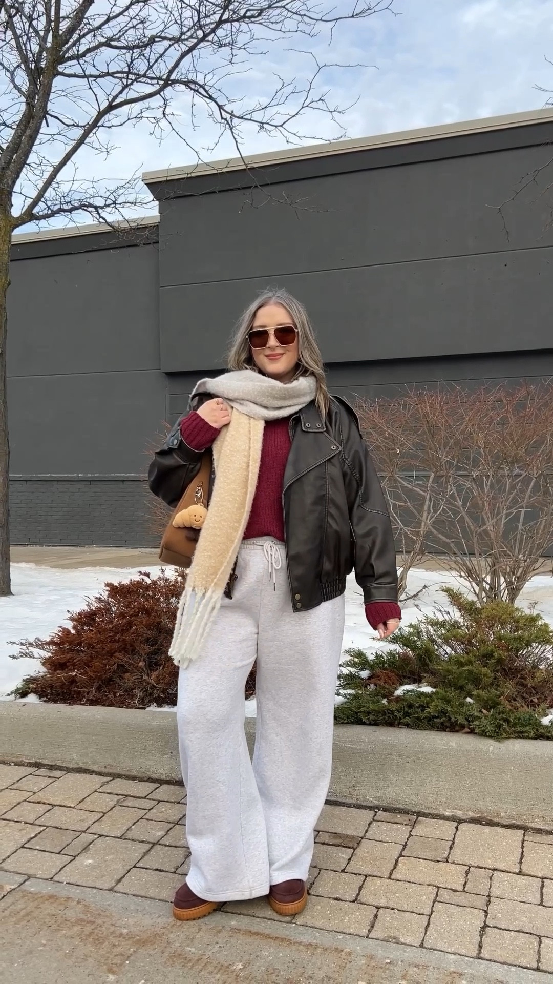Comfy casual winter outfit! Wearing my usual size L in the wide leg sweatpants, burgundy chenille sweater, white tee, and oversized leather jacket. Sorel snow boots are waterproof and so cozy, consider sizing up if you plan to wear thick socks. Linked similar scarves


#LTKsale #LTKmidsize #LTKwinter