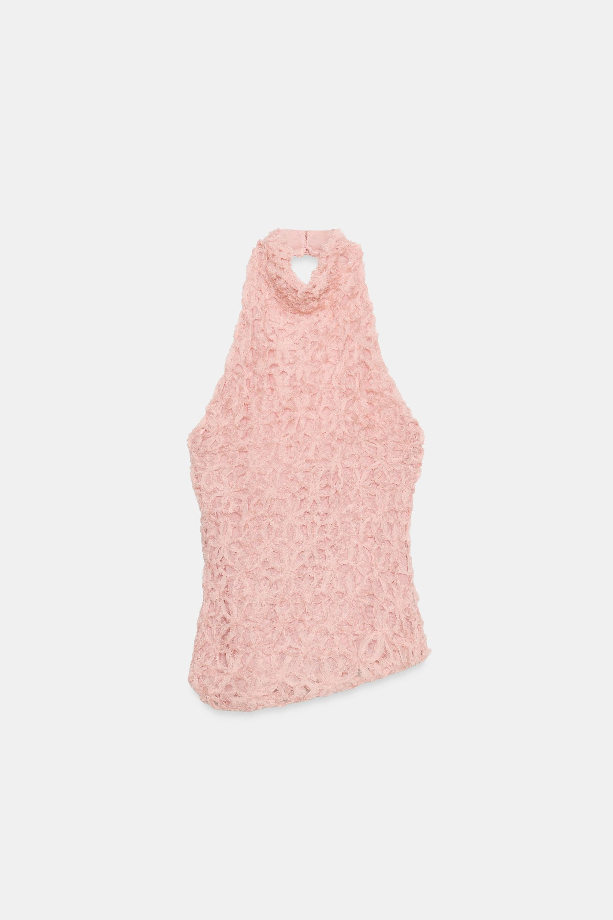 Model height: 178 cmHalter neck top with an open back. Featuring matching textured appliqu\u00e9 ... | Zara UK