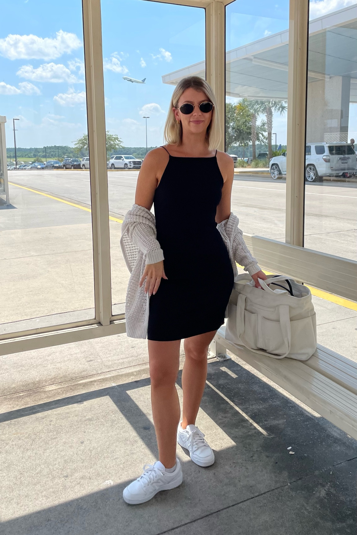 Travel outfit 🤍 this dress is $10 and so soft and comfortable 
This knit cardigan is old from GAP 

#LTKtravel #LTKshoecrush #LTKstyletip