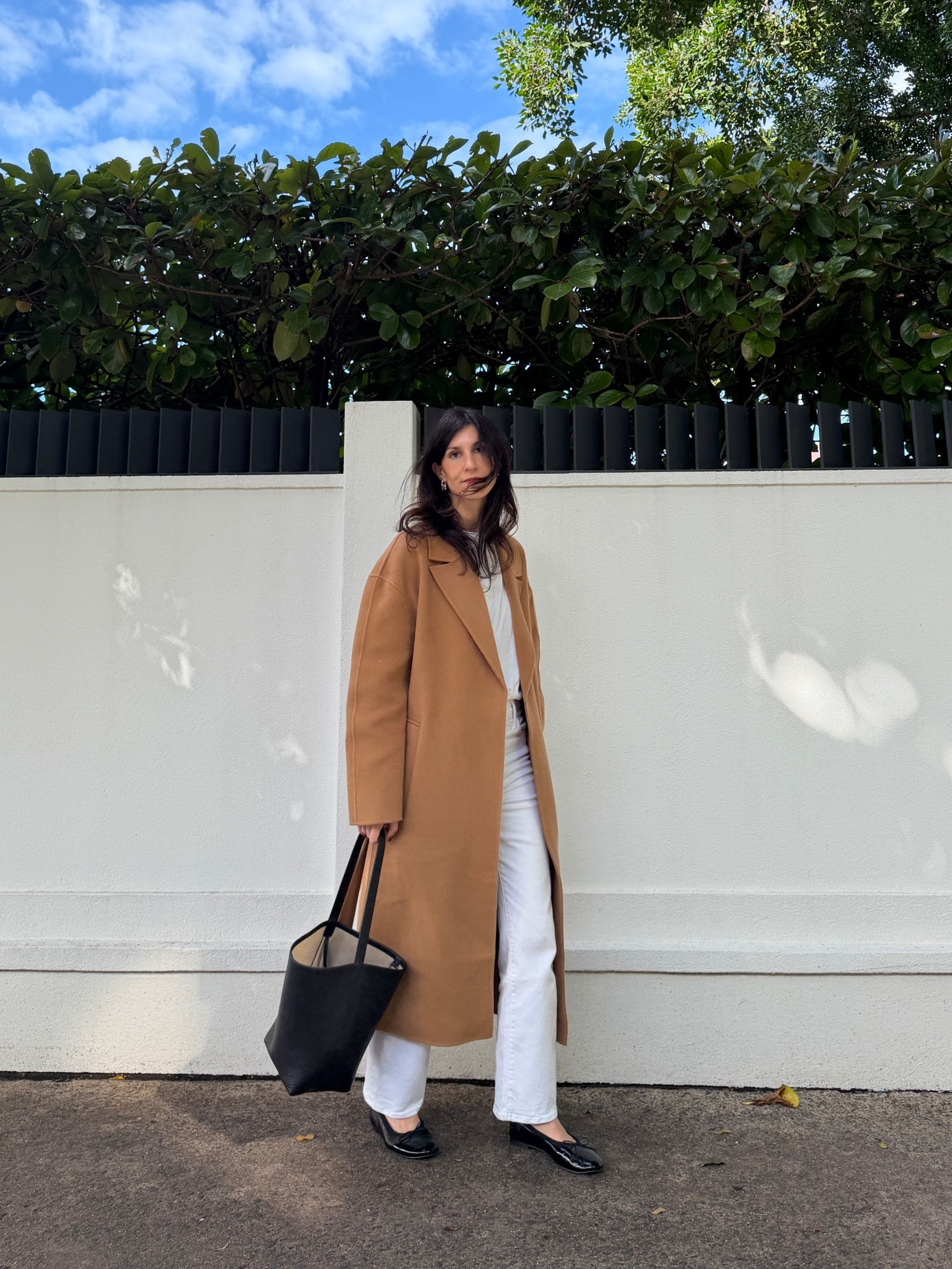 Wearing tee in size S, jeans in size 26, coat in size M and shoes in AU9