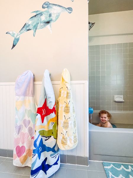 PARENTING TIP for bath time with littles💦 we love the hooded towels from pottery barn kids. We buy them on sale and dont personalize them to save money. They are high quality, keep the kids warm after tub time and last for YEARS! 

Also, they make hanging up towels for kids super easy!

#parentingtips #lovemypbk #kidbathroom #bathroominspo