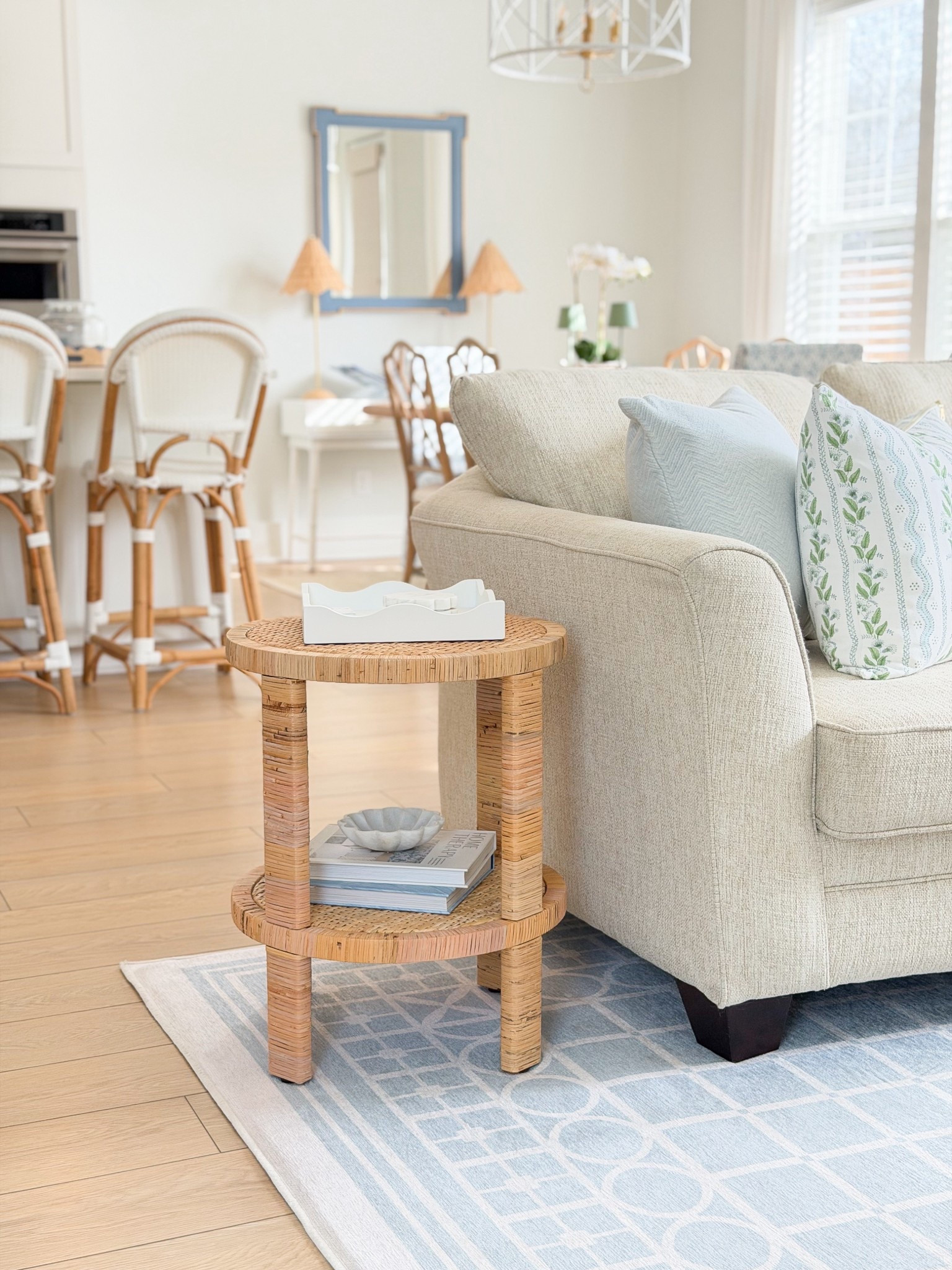 Classic coastal living room furniture and decor ✨

Rattan side table, target side table, blue and white rug, gray Malin ruggable, ruggable, living room rug, Serena and Lily counter stools, Serena and Lily style, living room furniture, living room style, Grandmillennial style, Grandmillennial decor 

#LTKHome