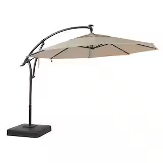 Home Decorators Collection 11 ft. LED Round Offset Outdoor Patio Umbrella in Sunbrella Sand YJAF0... | The Home Depot