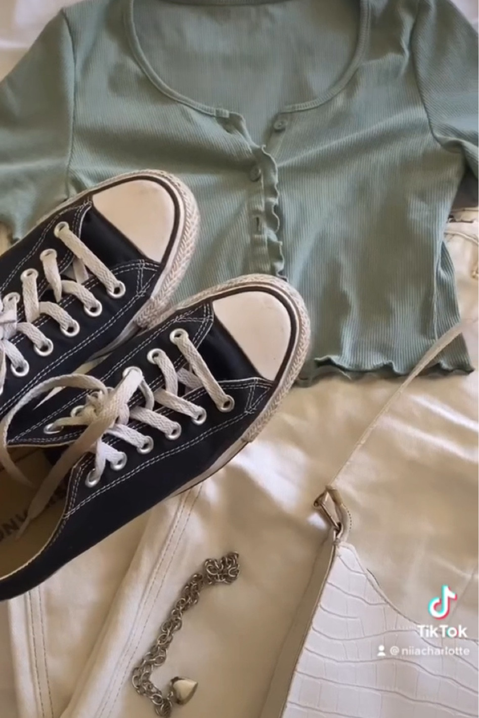 chuck taylor all star classic, black converse, silver jewelry, silver necklace, silver heart chain necklace, black sneakers, white cargos, white pants, cargo pants, white snakeskin shoulder bag

#LTKfit #LTKstyletip #LTKshoecrush