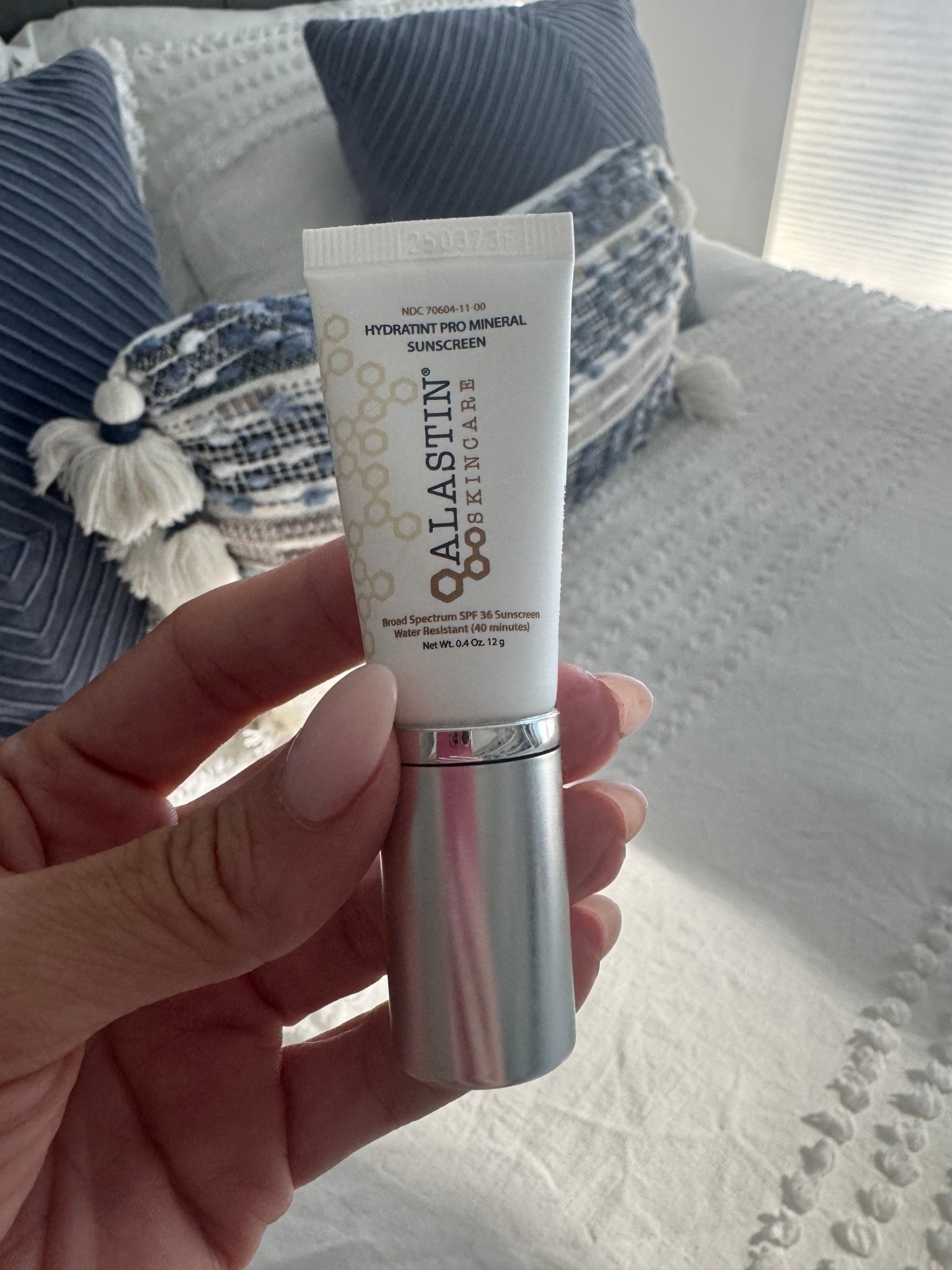 My ABSOLUTE favorite tinted sunscreen I wear EVERY SINGLE DAY!!! 

**This is the travel size & old packaging shown in picture. 

#LTKOver40 #LTKgrwm #LTKBeauty