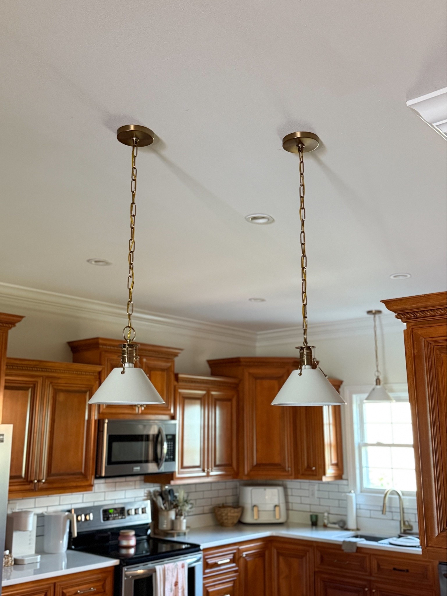 My kitchen pendant lights are on major sale at Wayfair! These come in several sizes and also black. We’ve been so happy with them!