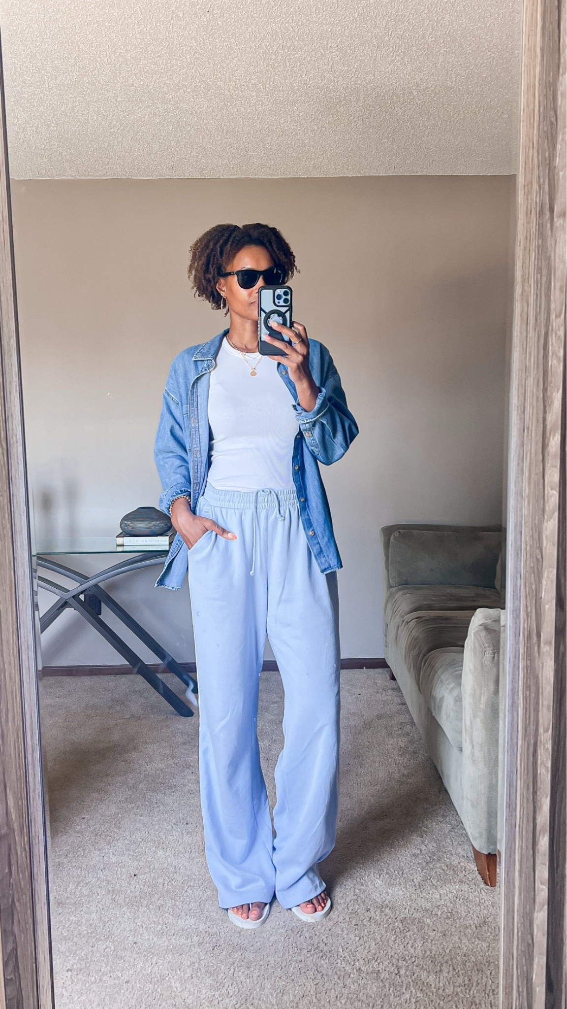 My simple travel outfit formula. Sweat pants, a tank top, and I added a denim top if it’s chilly. Flip flops for a no effort summer travel look.

#LTKootd #LTKOver40 #LTKTall