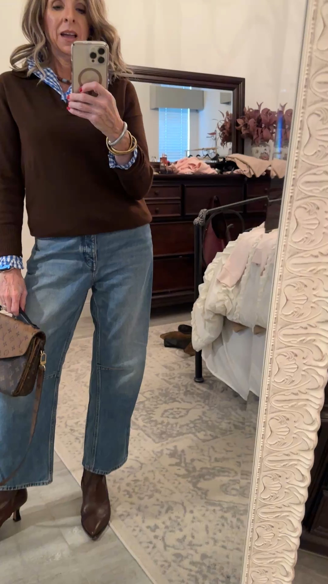 Everyday style that still feels polished ✨
I layered a classic sweater over a crisp shirt, added comfy straight-leg denim, and finished the look with sleek ankle boots. Perfect for errands, lunch dates, or just feeling put-together without trying too hard 🤍
This gingham top is a favorite I have it in two colors. Denim on sale but also linked another option.

#LTKSaleAlert #LTKootd #LTKOver40