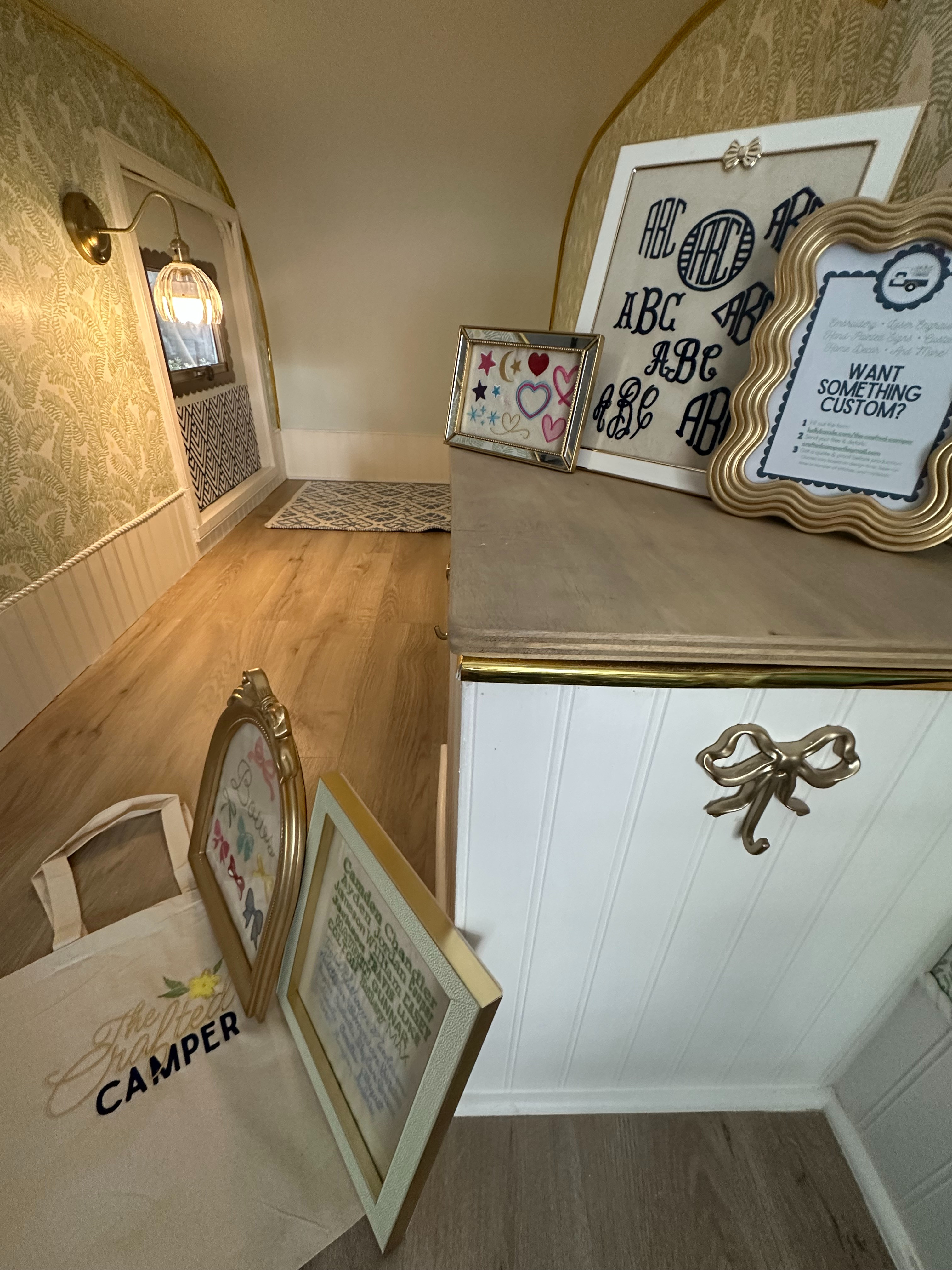 This is a sneak peek into the inside of my Crafted Camper (my mobile embroidery studio that I built from the ground up). From the wallpaper to the laminate flooring, everything I've used to make this space, is included in this post.  

 #LTKHome