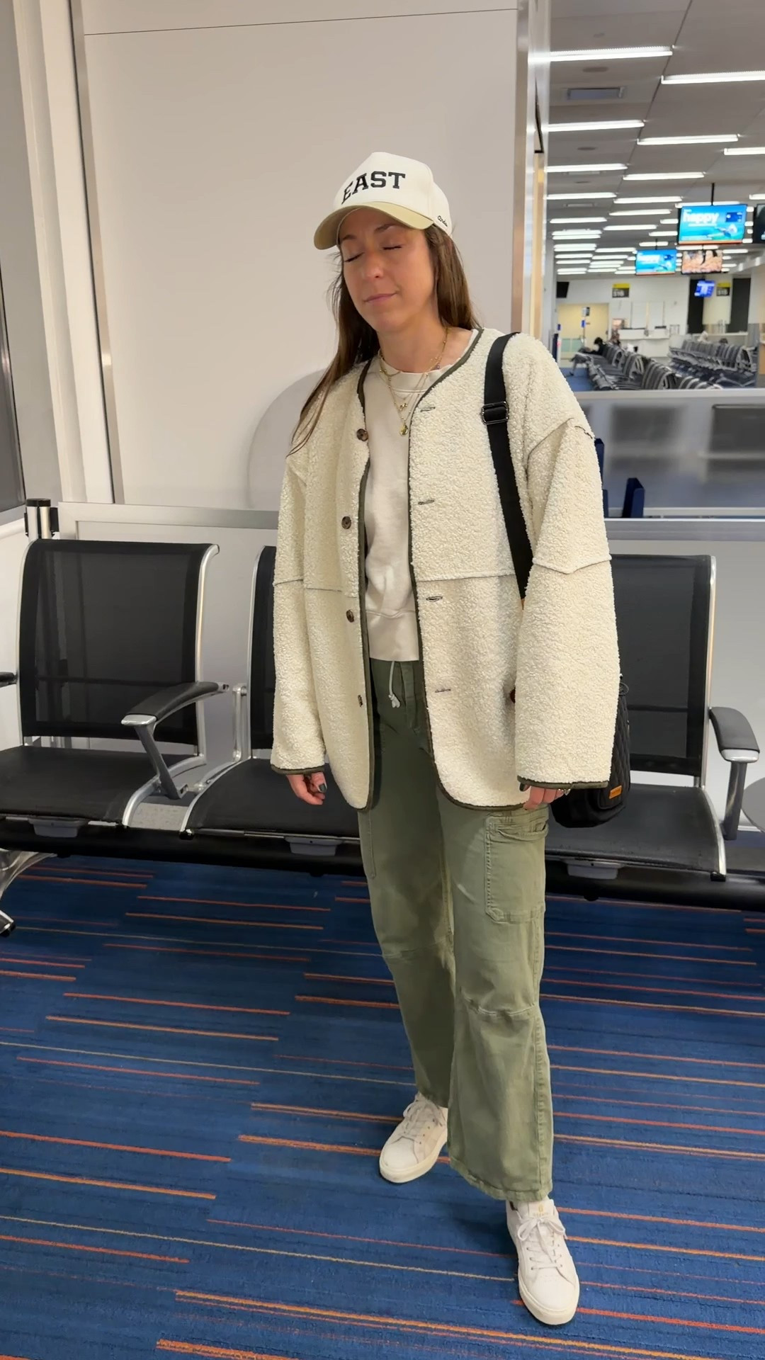Comfortable travel and airport staples! 

Andar hat for covering my sleepy eyes on the plane 😁 

Andar Wallace water bottle
Bag we designed! Keeps me hydrated all day long plus my essentials all in one place, I truly never leave home without it!

Banana Republic reversible Sherpa- cozy layer for when it gets cold on the plane!

Old Navy cropped crew neck- another easy layering piece 

Comfortable cargo style pants. I feel put together but they are comfortable for long flights. 

Greats shoes- easy neutral comfortable shoe so I don’t have to pack any other sneakers!

#LTKootd #LTKFindsUnder100 #LTKTravel