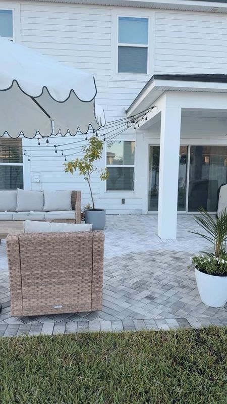 OUR PATIO FURNITURE (this set is so comfortable and holds up so well) & PLANTERS #outdoor #patio #coastalhome #rattan #blackandwhite #scallops  

#LTKstyletip #LTKfindsunder100 #LTKhome