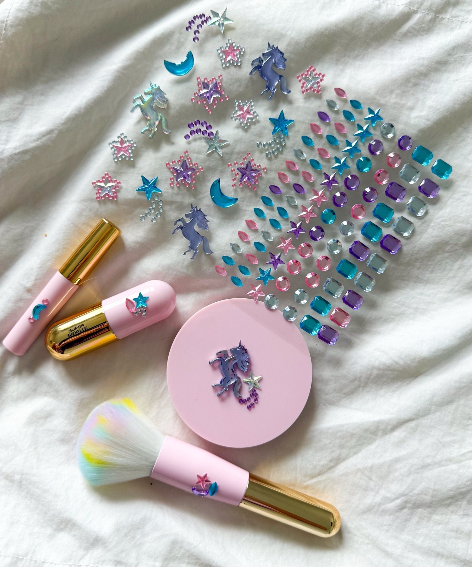 Tiny beauty, but make it ✨magical✨ 🦄💎
Berkley has been obsessed with this little Super Smalls set! The soft shimmer powder, clear mascara, cotton-candy scented pink lip balm + all the gem stickers to decorate everything. Basically a preschool girl’s dream 😂💗

Such a cute gift idea if you have a little one who loves playing makeup without it feeling too grown up. Linking it here because this one was a BIG hit in our house. ✨

gifted by @Super Smalls 

#LTKKids #LTKGiftGuide #LTKFamily #SuperSmalls #Gifted #KidsGiftIdeas #GirlMomFinds #LittleGirlGifts #PretendMakeup #KidsBeauty #MomFinds #MagicalMoments

#LTKBeauty #LTKKids #LTKmomlife