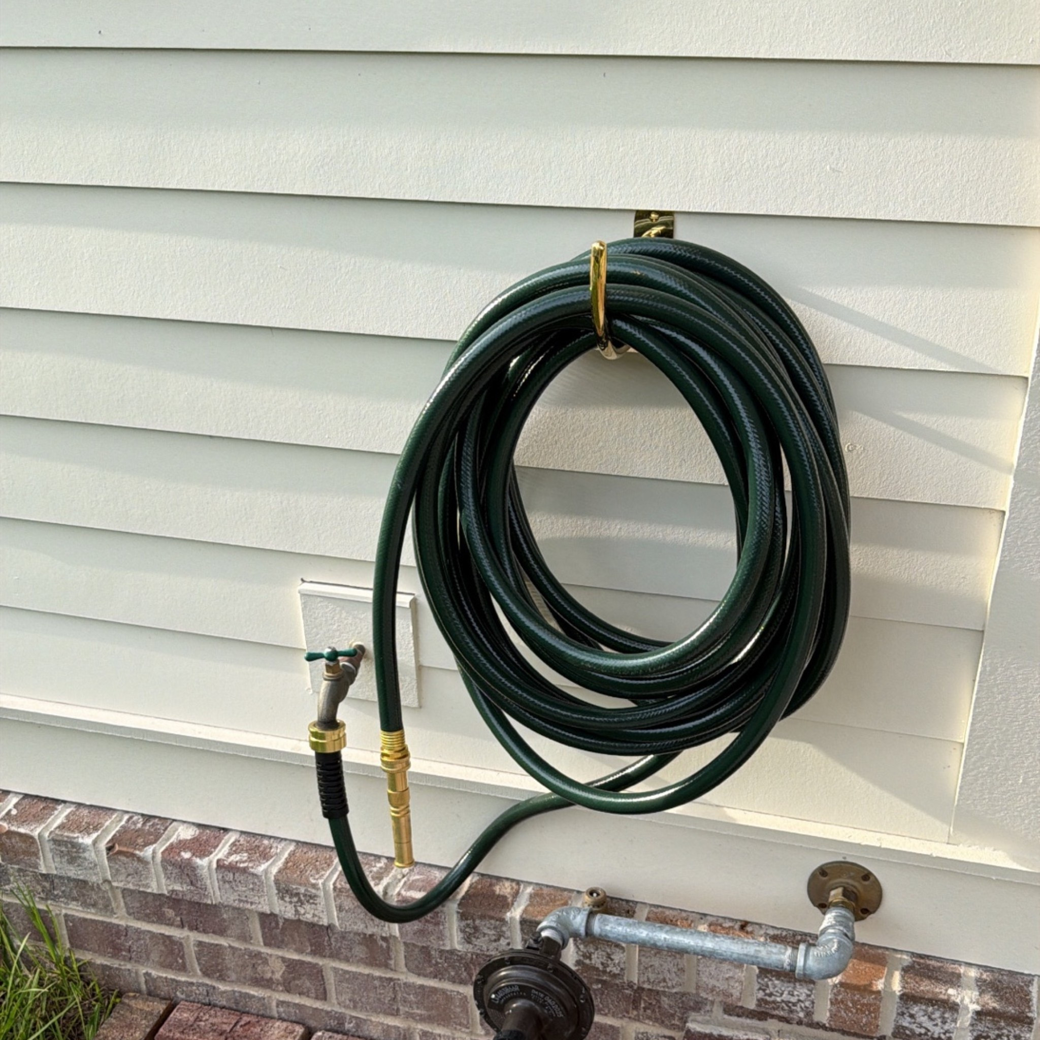 Hose, nozzle, and hanger

#LTKHome