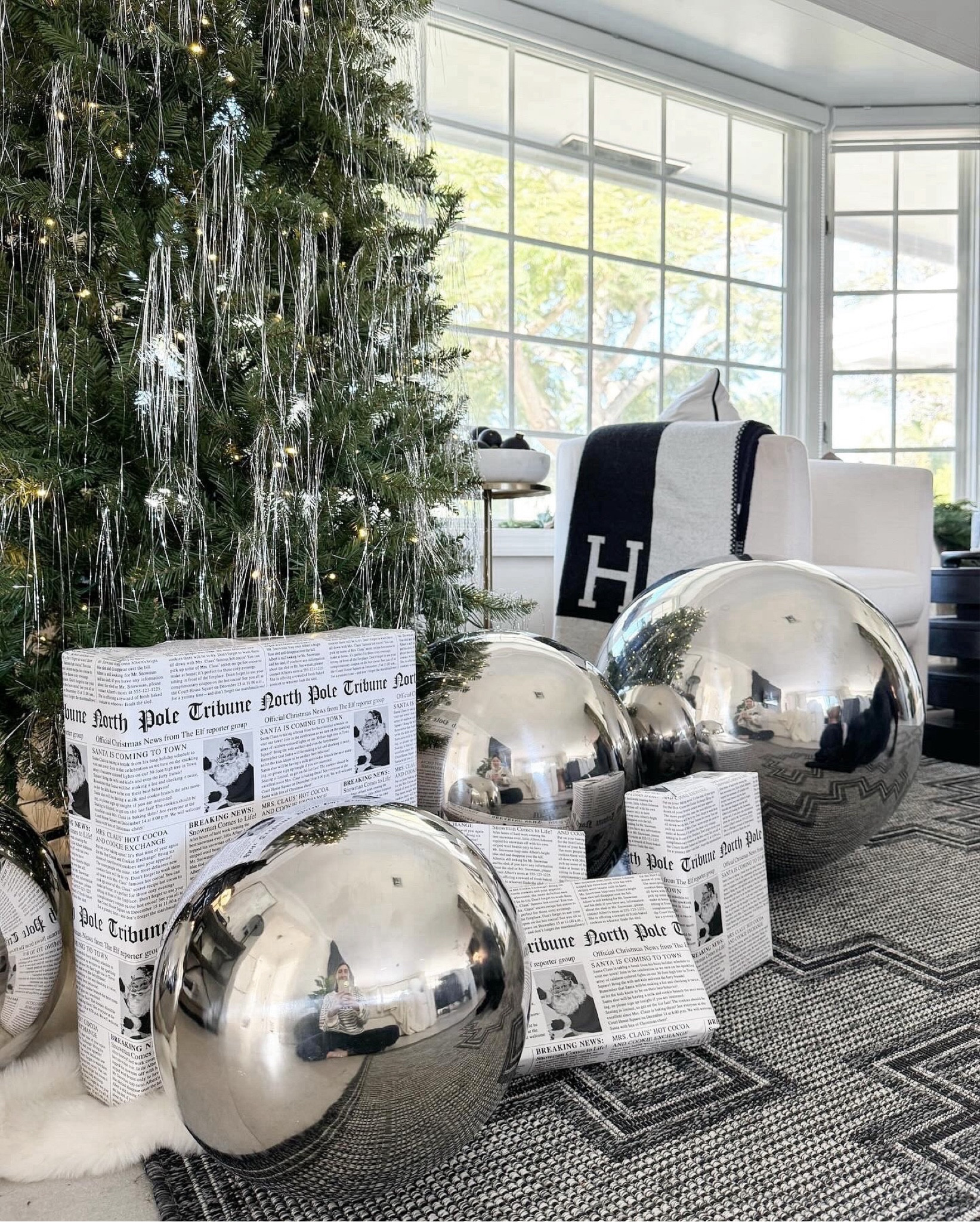 Christmas decor / large mirrored balls / Christmas wrapping paper 

#LTKStyleTip #LTKHome #LTKSeasonal
