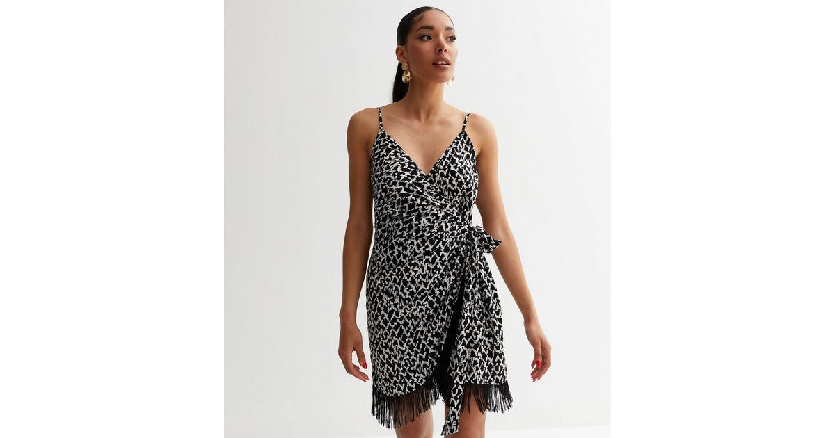 Black Abstract Strappy Fringe Hem Mini Dress
						
						Add to Saved Items
						Remove from Sa... | New Look (UK)