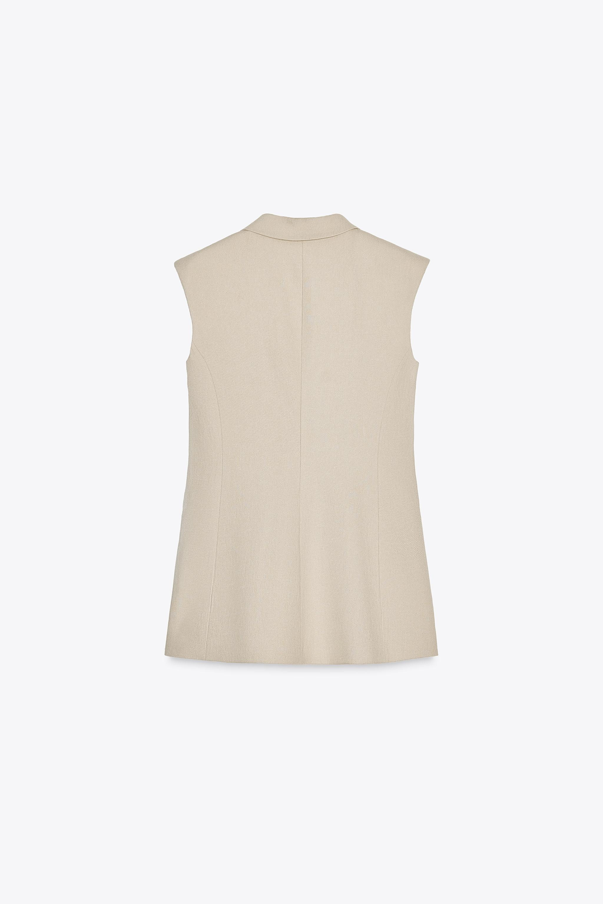 ZARA WOMAN COLLECTIONGilet realizzato in filato misto lino e viscosa. Revers classici e giromanic... | Zara IT