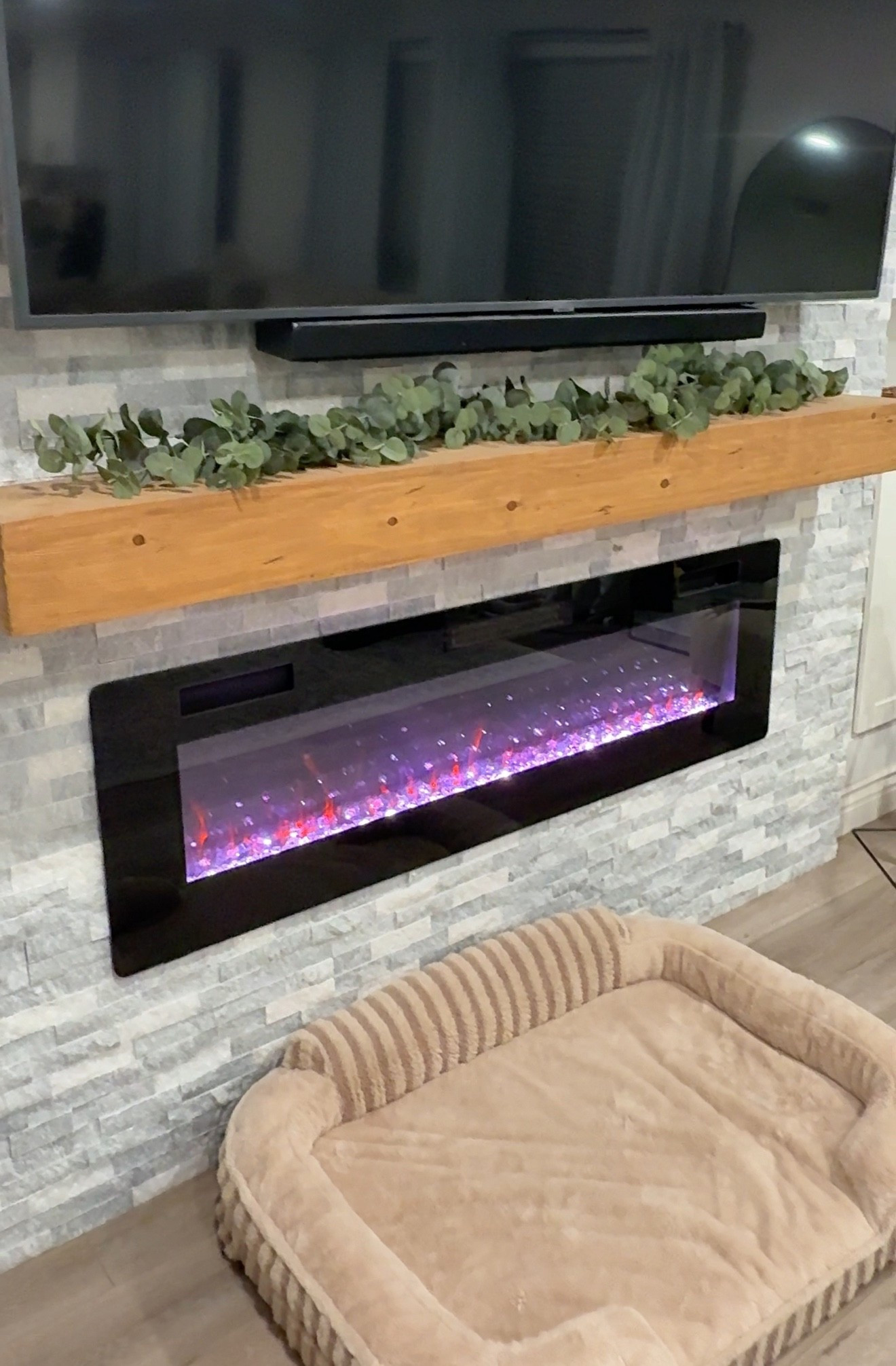 Cozy vibes 🔥 

LTK home, electric fireplace, mantel, mantel garland, Lesure dog bed 

#LTKHome