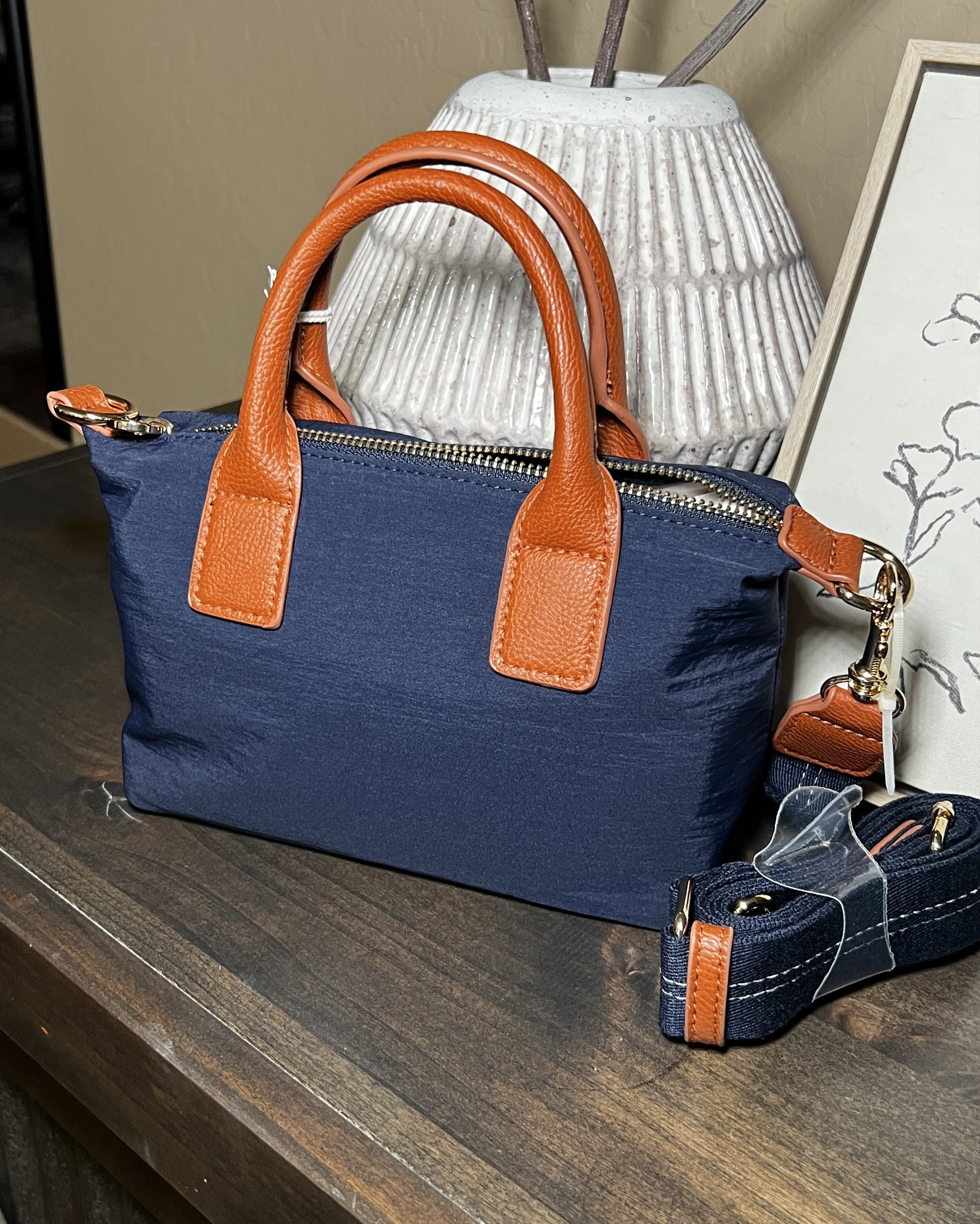 Found this lookalike at Target. Super cute tiny hand bag. Only $20

#LTKSaleAlert #LTKItBag #LTKautumn