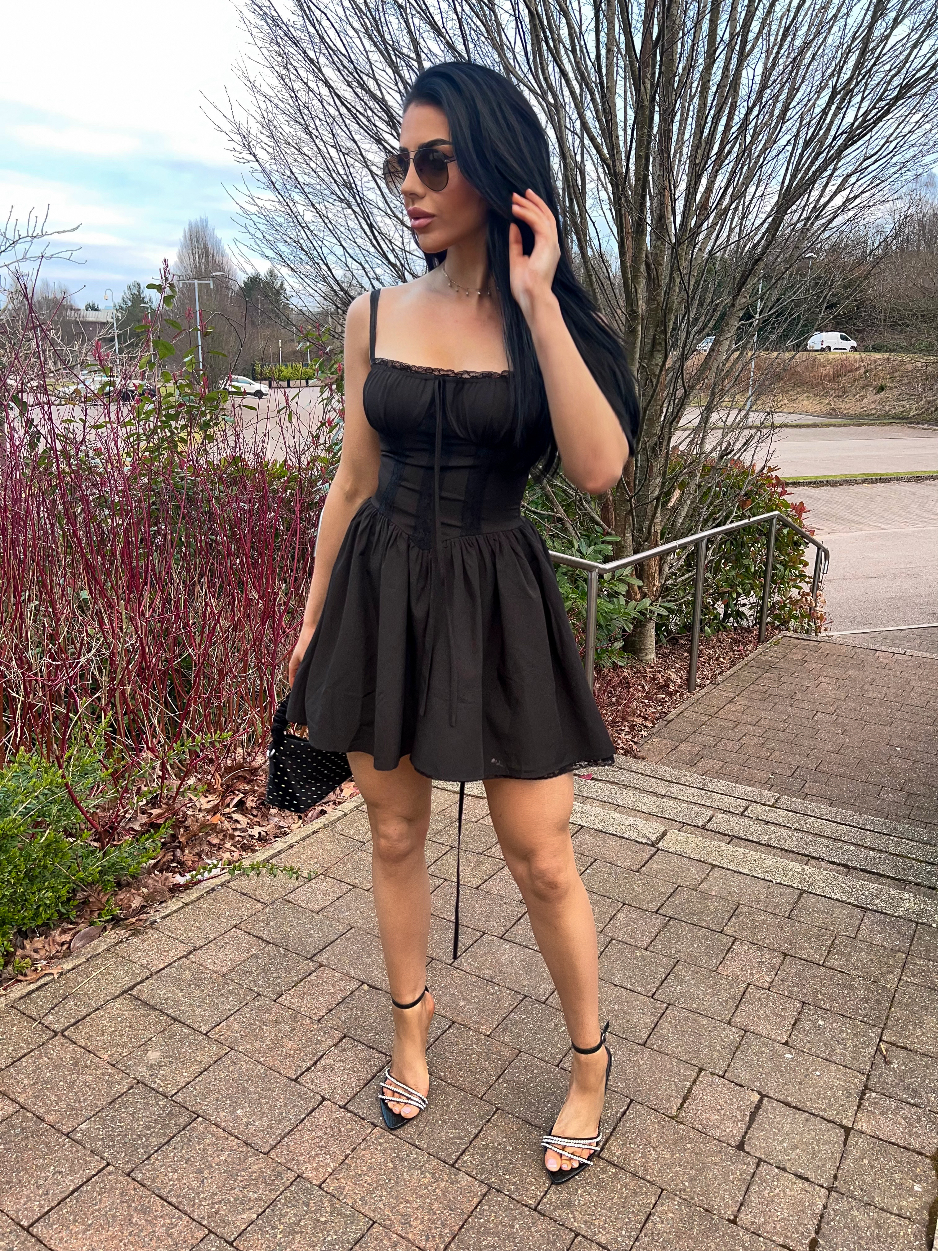 Modern glam with a vintage twist 🖤
This Retro Stage mini dress is serving corset-core meets timeless elegance — the perfect LBD for a night out or date night. Paired it with crystal heels and a studded bag for that extra edge. 

 #LTKuk #LTKsummer #LTKdresses