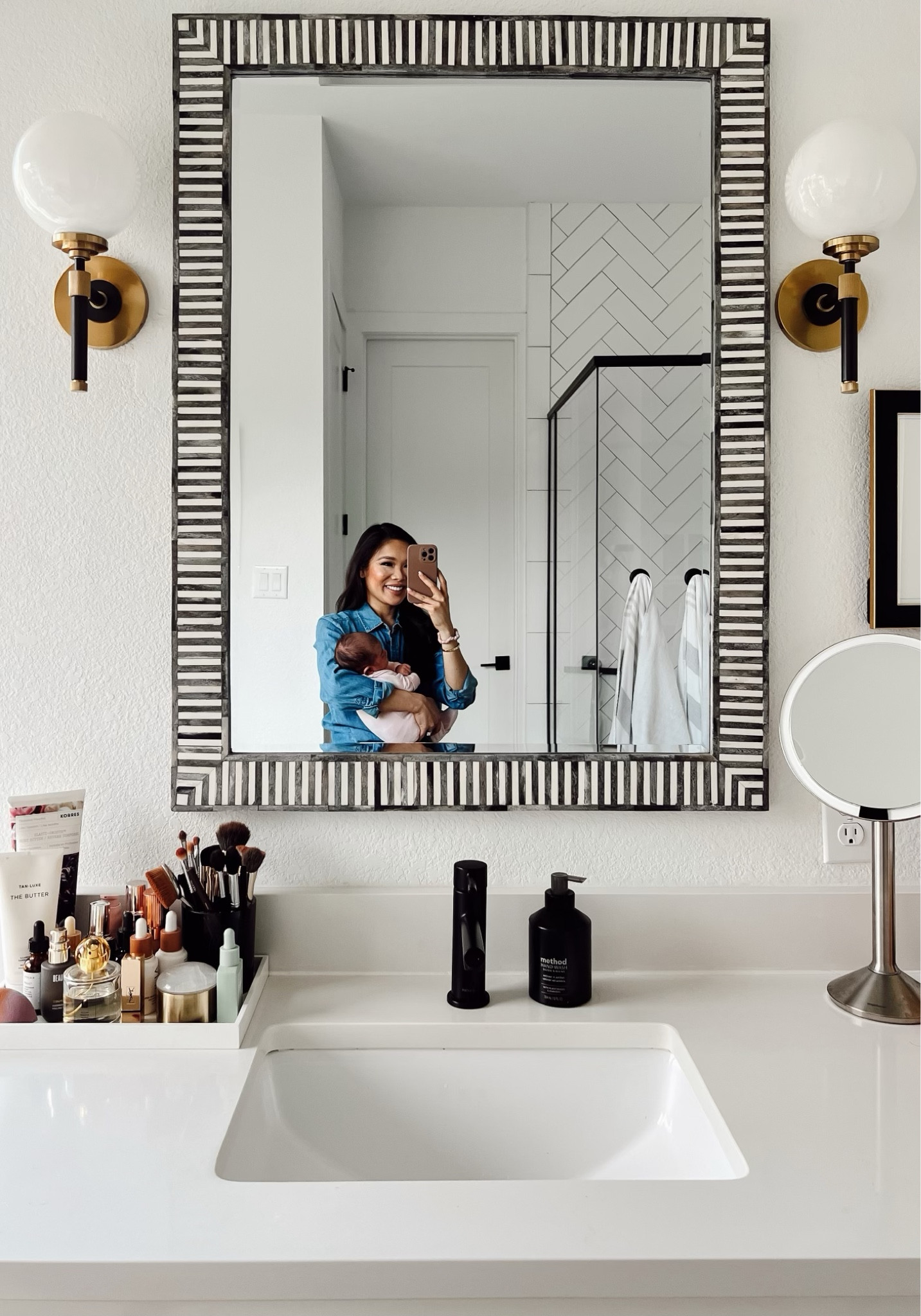 Loving my bathroom mirror that has upgraded the space! The bone striping inlay is so pretty and chic. On sale for 20% off with code PERKS. Linking bathroom tray, lighting and more 