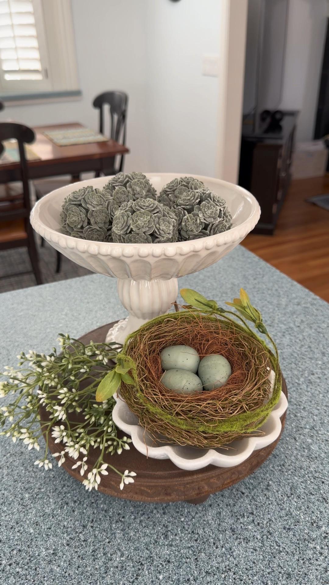 Do you like simple  styling

A riser, faux plant, small bird’s nest, and a classic style bowl with green filler—easy pieces that make a vignette feel finished without adding more.
 
🏠 I share real-life decor, home finds, and organization for spaces that are pretty, not perfect. 💫