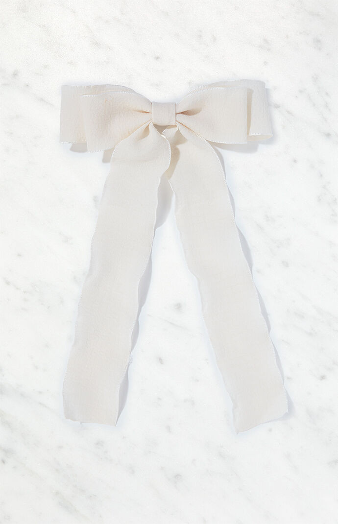 White Ruffle Bow Hair Clip in Cream | PacSun