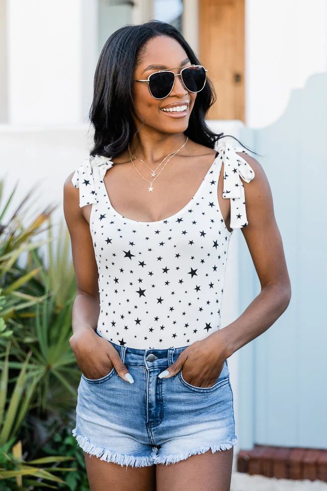 No Regrets Black/Ivory Tie Strap Star Bodysuit FINAL SALE | The Pink Lily Boutique