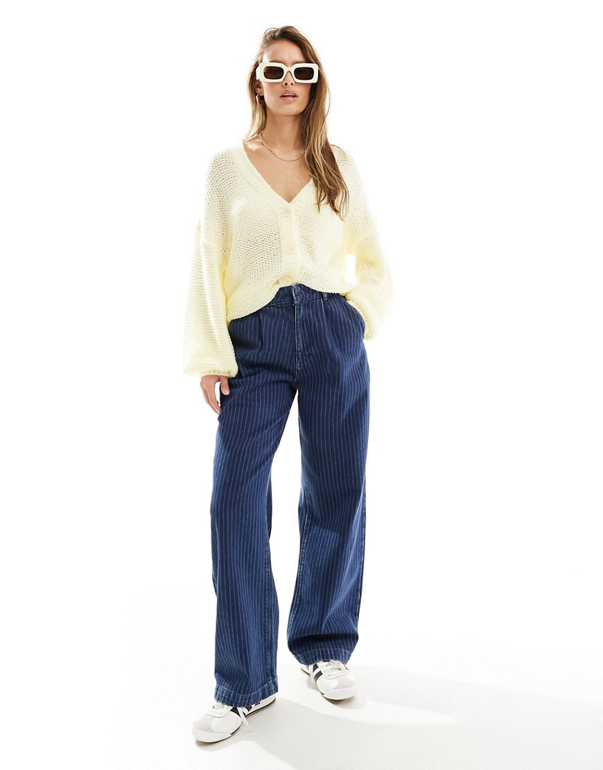 ASOS DESIGN loose knit cardigan in buttermilk-Yellow | ASOS (Global)