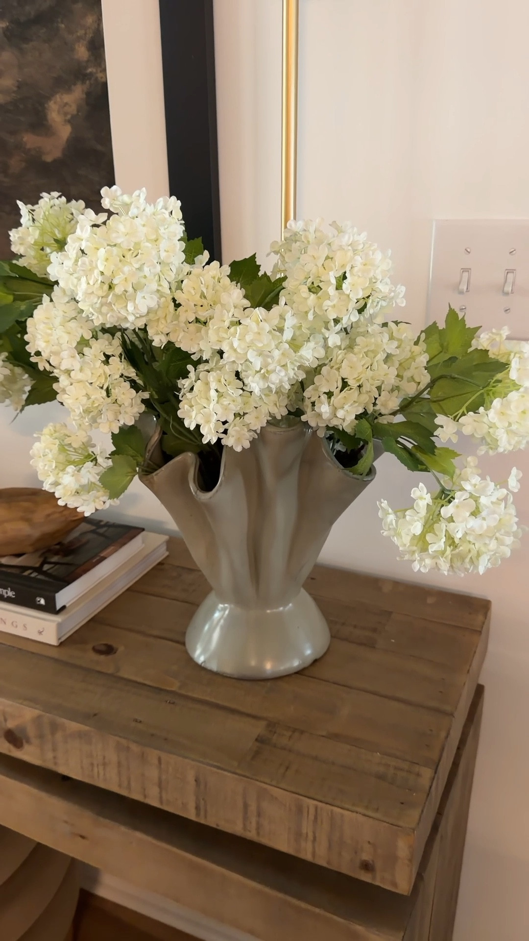 This vase is stunning and very affordable! I love the ruffled design! Use with florals or as a stand alone piece  