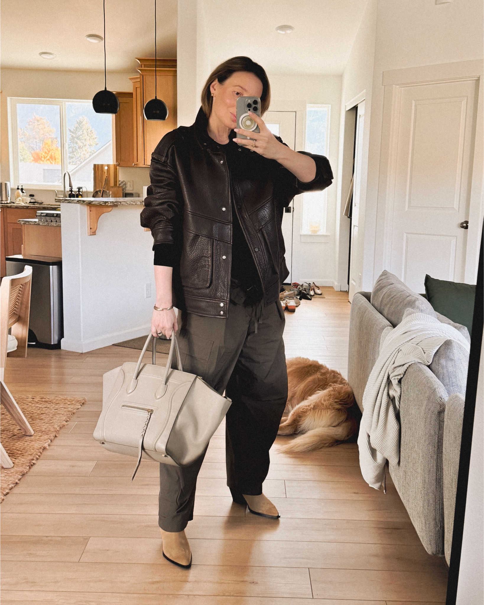 30 weeks of pregnancy, maternity OOTD idea: Isabel Marant Etoile Rebecca cargo pants (on sale at 24S right now) + Reiss Atelier Cleo Sheep leather jacket + Aeyde Ariel cowboy boots + Celine luggage Phantom medium bag (pre-owned bags linked from The Real Real). 

#LTKSaleAlert #LTKStyleTip #LTKSeasonal
