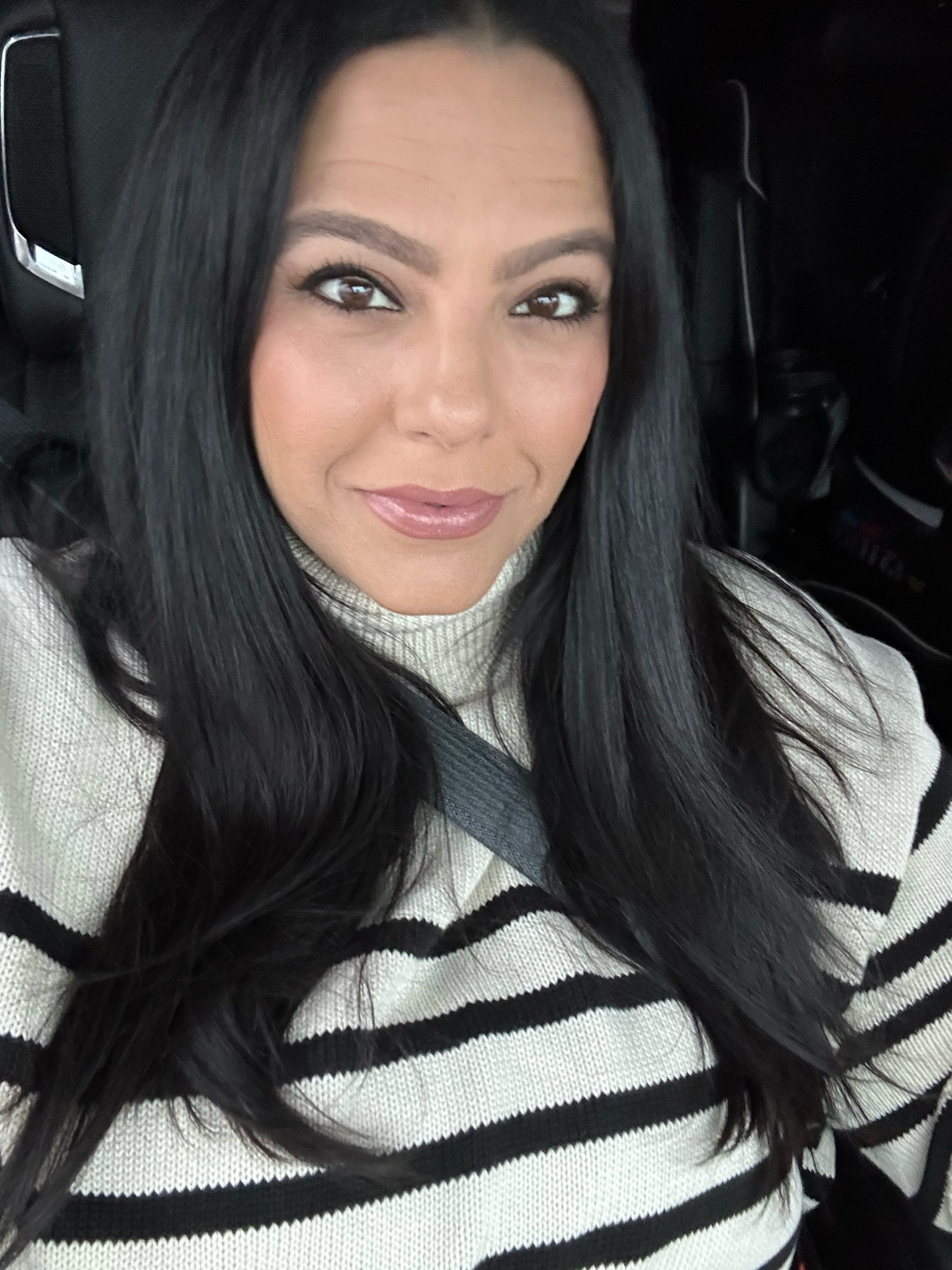 Black and white striped sweater, turtle neck 


#LTKover40 #LTKplussize #LTKmidsize