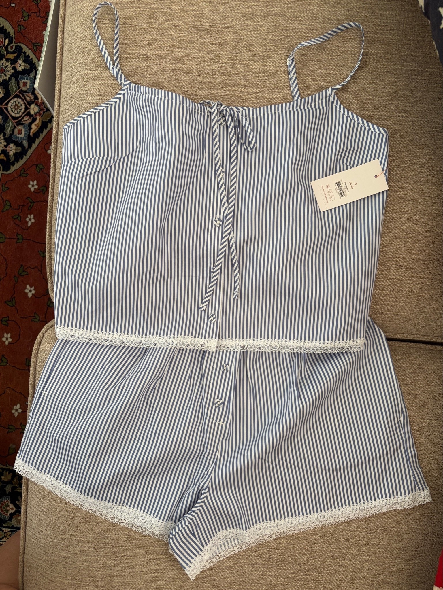 These adorable 100% cotton poplin pajamas are on sale. Perfect for hot summer nights, they are laced trimmed in blue and white stripes. This color is on clearance for $11.17.

#LTKmomlife #LTKOver40 #LTKSaleAlert