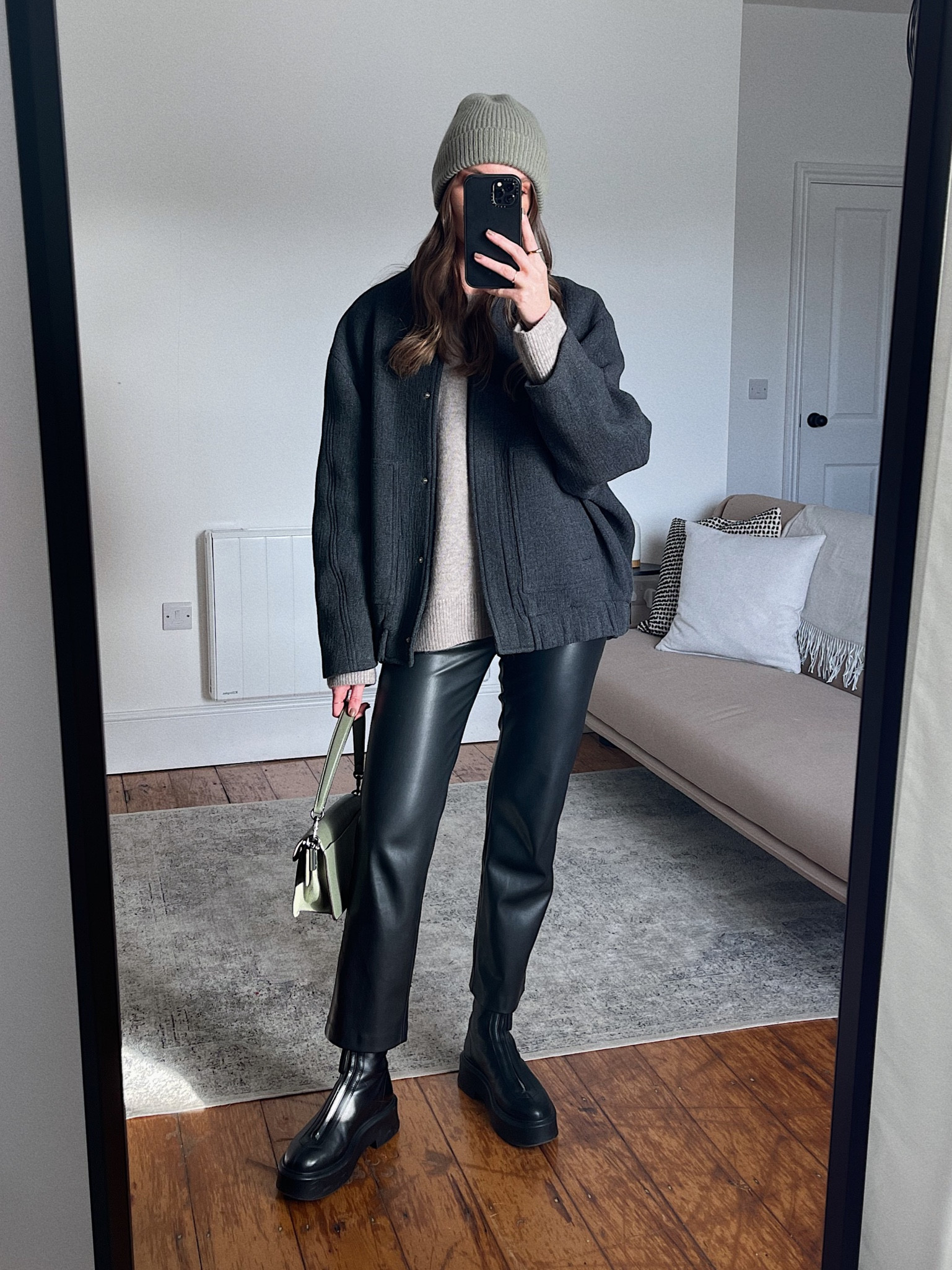 Oversized grey bomber jacket styling 
this exact one is from @zara [2346/643 and I wear the XS/S]
& other stories jumper, I wear a small
Warehouse faux leather trousers, I wear a UK 6. I’m 5ft 6ish. EB20 for 20% off
The Row zipper boots
Coach tabby 26 in fern
& other stories cashmere beanie 