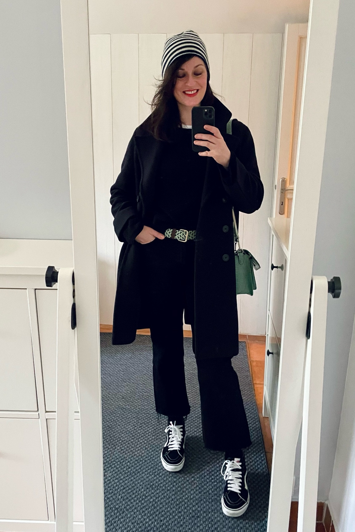 Striped cashmere beanie #cyrillus / Midnight blue peacoat #pablo / Black cotton jumper #uniqlo / White boyfriend tee #fruitoftheloom / Aqua green belt #BCBGMaxAzria / Black flare crop jeans #mango / Black Sk8 Hi sneakers #vans 

#LTKeurope #LTKover40 #LTKmidsize