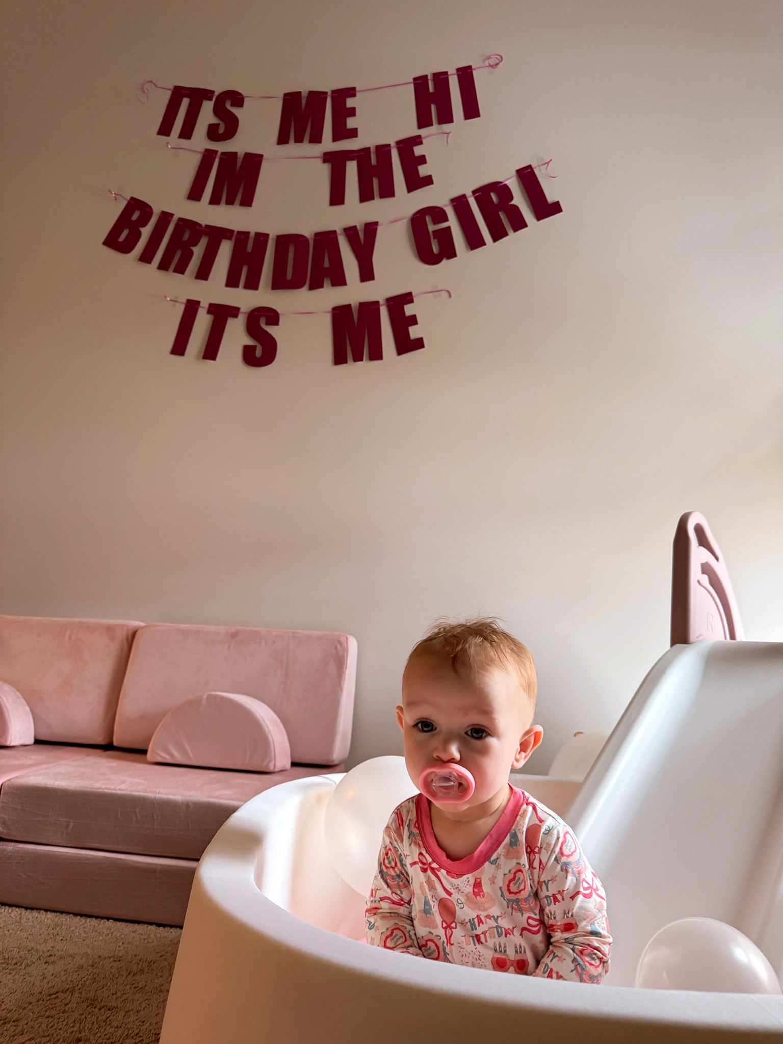 first birthday morning 🥹 her present was the slide, we didn’t wait to give her the other presents haha. she loves her couch and ball pit! restock coming soon on her birthday jammie’s! ellie wears a 6/12 in zippies, but can wear a two piece set in 2T really well with the cuffs folded once in IMJ. how cuteee is the birthday banner though? i had mirrorball balloons blew up as well😅🪩💖

#LTKGiftGuide #LTKBaby #LTKParties